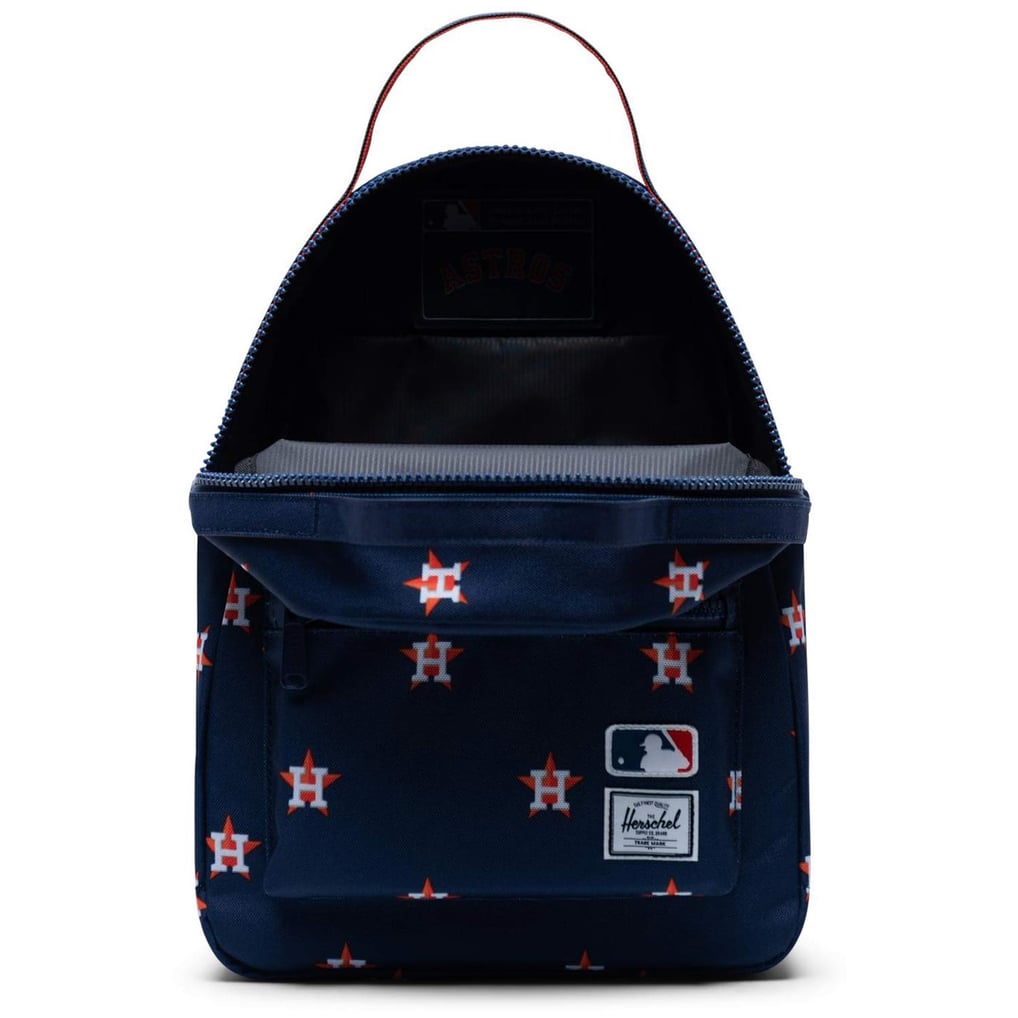 jansport backpack on model Big Student Color:Barred Ball Sucker Line through heads Fenwick Eagle Fenwick Trout Offering the same durability
